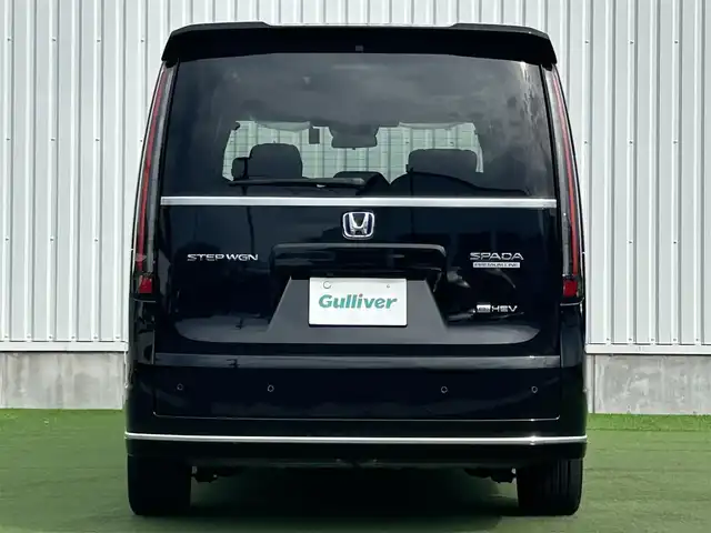 ホンダ ステップワゴン スパーダ eHEV プレミアムライン 香川県 2024(令6)年 1.4万km クリスタルブラックパール 純正11.4インチHonda CONNECTナビ/→フルセグ/CD/DVD/Bluetooth/USB/→Apple CarPlay/Android Auto/純正15.6インチリア席モニター/Honda SENSING/・マルチビューカメラシステム/・ACC（渋滞追従機能付アダプティブクルーズコントロール/・LKAS（車線維持支援システム）/・CMBS（衝突軽減ブレーキ）/・前後誤発進抑制機能/・ブラインドスポットインフォメーション/・アダプティブドライビングビーム/LEDオートライト/ハーフレザーシート/前席/二列目シートヒーター/オットマン/両側パワースライドドア/ハンズフリーアクセスパワーテールゲート/電子パーキング/オートブレーキホールド/革巻きステアリング/ハンドルリモコン/パドルシフト/純正17インチアルミ/純正フロアマット/アイドリングストップ/プッシュスタート/キーレス