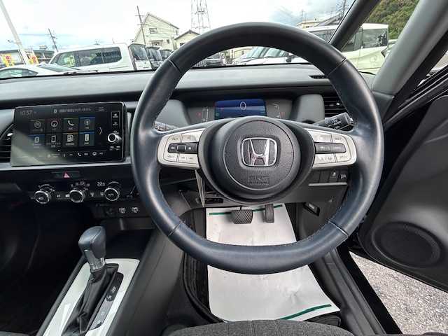 ホンダ フィット e:HEVホーム 大阪府 2023(令5)年 4.6万km クリスタルブラックパール 純正ディスプレイオーディオ(BT/USB/フルセグ)/バックカメラ/衝突被害軽減システム/レーンキープアシスト/コーナーセンサー/アダクティブクルーズコントロール/オートライト/オートマチックハイビーム/純正フロアマット/純正ドライブレコーダー/純正ビルトインETC/ハーフレザー/アイドリングストップ/LEDヘッドライト