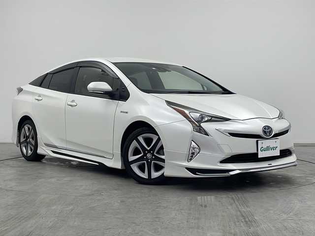 トヨタ プリウス S ツーリングセレクション 三重県 2016(平28)年 6万km ホワイトパールクリスタルシャイン 禁煙車/純正ナビ/・フルセグ/Bluetooth/CD/DVD/AM/FM/モデリスタエアロ/レーダークルーズコントロール/バックカメラ/前席シートヒーター/オートハイビーム/LＥＤフォグ/プリクラッシュセーフティ/レーンキープアシスト/革巻ステアリング/プッシュスタート/スマートキー/ドライブレコーダー/ウィンカーミラー/電動格納ミラー/純正17インチＡＷ