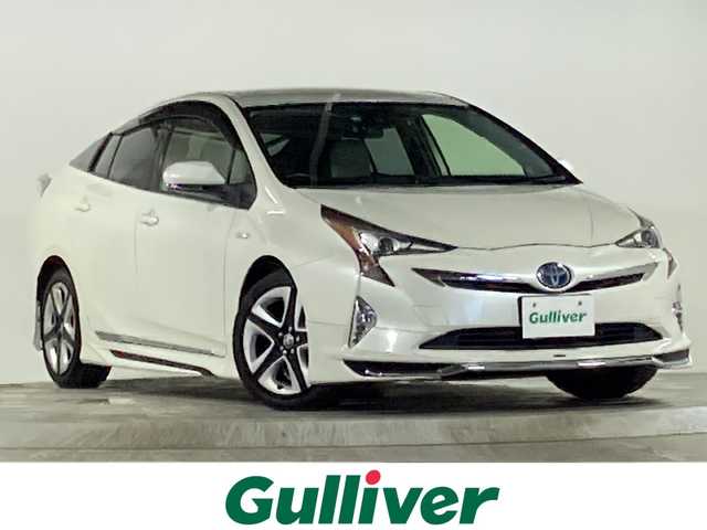 トヨタ プリウス S ツーリングセレクション 広島県 2016(平28)年 6万km ホワイトパールクリスタルシャイン 禁煙車/プリクラッシュセーフティ/レーンキープアシスト/モデリスタエアロ/純正ナビ/・フルセグ/Bluetooth/CD/DVD/AM/FM/レーダークルーズコントロール/バックカメラ/ETC/前席シートヒーター/オートハイビーム/LＥＤフォグ/革巻きステアリング/ドライブレコーダー/ウィンカーミラー/電動格納ミラー/純正17インチアルミホイール/スマートキー/スペアキー/純正ドアバイザー/横滑り防止装置
