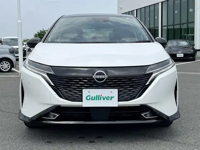 日産 オーラ G レザーエディション 奈良県 2022(令4)年 2.7万km ピュアホワイトパール / スーパーブラック 2トーン 社外ナビ　/フルセグ　/ＤＶＤ　/Ｂｌｕｅｔｏｏｔｈ　/全方位カメラ　/ＥＴＣ　/前後ドライブレコーダー　/レザーシート　/社外フロアマット　/純正アルミホイール　/オートLEDライト/衝突被害軽減ブレーキ　/W+サイド+カーテンエアバッグ/保証書