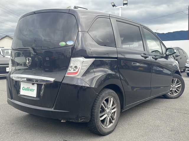 ホンダ フリード GH 長野県 2012(平24)年 11.4万km プレミアムブラキッシュパール ・純正7インチナビゲーション/CD DVD ワンセグTV/・バックカメラ/・ETC/・片側パワースライドドア/・アイドリングストップ/・スマートキー/・社外15インチアルミホイール
