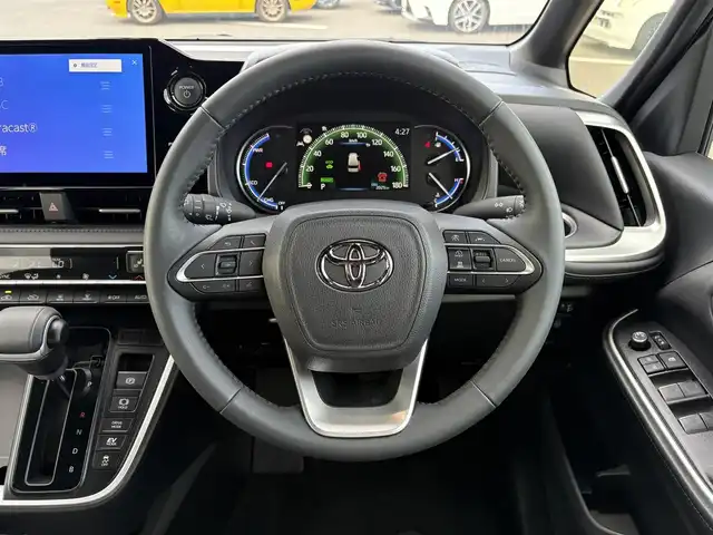 トヨタ ヴォクシー ハイブリッド S－Z 大分県 2025(令7)年 0.2万km アティチュードブラックマイカ ・純正ナビ(CD/DVD/BT/USB)/・フリップダウンモニター/・バックカメラ/・フルセグテレビ/・プリクラッシュセーフティ/・コーナーセンサー/・AC100V/・オートハイビーム/・シートヒーター/・ブレーキホールド/・ステアリングリモコン/・スマートキー/・プッシュスタート