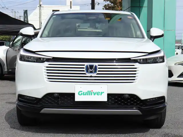 ホンダ ヴェゼル ハイブリッド e:HEV Z 神奈川県 2025(令7)年 0.1千km プラチナホワイトパール ワンオーナー/Honda SENSING/ブラインドスポットインフォメーション/アダプティブドライビングビーム(ADB)/後退出庫サポート/Honda CONNECTディスプレー＋ETC2.0車載器＋ワイヤレス充電器/運転席助手席シートヒーター/ハンズフリーアクセスパワーテールゲート(予約クローズ機能付)/LEDシーケンシャルターンシグナルランプ/マルチビューカメラシステム＋プレミアムオーディオ/18インチアルミホイール/コンビシート/本革巻きステアリング/保証書/取説、ナビ説/スペアスマートキー