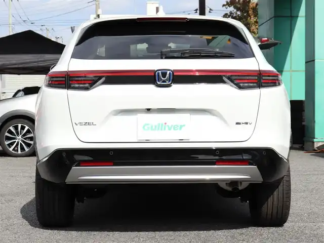 ホンダ ヴェゼル ハイブリッド e:HEV Z 神奈川県 2025(令7)年 0.1千km プラチナホワイトパール ワンオーナー/Honda SENSING/ブラインドスポットインフォメーション/アダプティブドライビングビーム(ADB)/後退出庫サポート/Honda CONNECTディスプレー＋ETC2.0車載器＋ワイヤレス充電器/運転席助手席シートヒーター/ハンズフリーアクセスパワーテールゲート(予約クローズ機能付)/LEDシーケンシャルターンシグナルランプ/マルチビューカメラシステム＋プレミアムオーディオ/18インチアルミホイール/コンビシート/本革巻きステアリング/保証書/取説、ナビ説/スペアスマートキー
