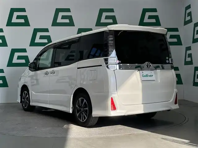 トヨタ ヴォクシー ZS 煌Ⅱ 鹿児島県 2020(令2)年 6.2万km ホワイトパールクリスタルシャイン 純正１０インチナビ【NSZN-Z68T】/(Bluetooth.TV.CD.DVD)/バックモニター/トヨタセーフティセンス/・レーンキープアシスト/・プリクラッシュセーフティ/・オートハイビーム/両側パワースライドドア /ETC2.0/純正ドライブレコーダー【DRT-H68A】/LEDヘッドライト/純正フロアマット/純正ドアバイザー