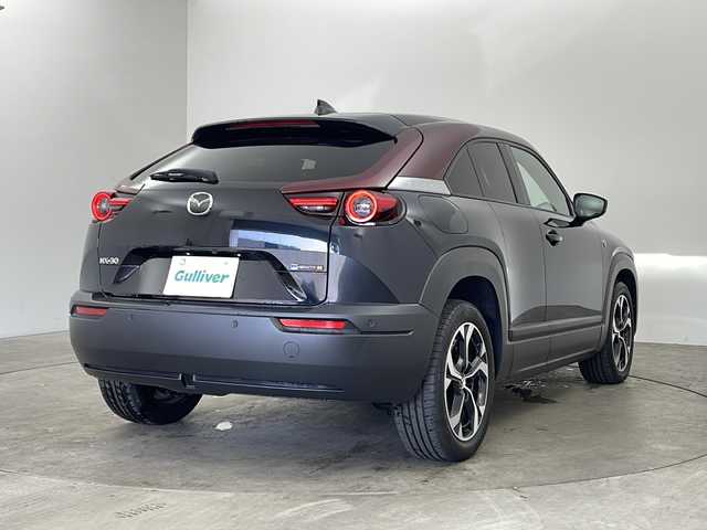 マツダ ＭＸ－３０ロータリーＥＶ エディションR 兵庫県 2023(令5)年 0.5万km 黒Ⅱ ・純正ナビ/Bluetooth/USB/HDMI/TV/・360°ビューモニター/・ビルトインETC/・車間維持制御/・速度標識警報/・ドライバーモニタリング/・前後側方接近車両検知/・車線逸脱警報システム/・ブラインドスポットモニタリング/・ディスタンス＆スピードアラート/・レーンキープアシストシステム/・スマートブレーキサポート/・スマートシティブレーキサポート/・緊急時車線維持支援/・パーキングセンサー/・ヘッドアップディスプレイ/・ハーフレザーシート/・運転席パワーシート/・前席シートヒーター/・革巻きステアリング/・パドルシフト/・ステアリングヒーター/・レーダークルーズコントロール/・アダプティブＬＥＤヘッドライト/・純正18インチアルミホイール