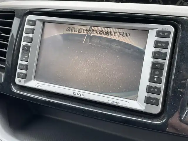 トヨタ ヴォクシー X 岡山県 2005(平17)年 10.7万km ダークグレーマイカM 登録時走行距離106556km/純正SDナビ/(AM/FM/TV/DISC)/両側スライド/車外バックカメラ/３列シート/リモコンキー/パワーステアリング/パワーウィンドウ/ABS/ETC/純正15インチアルミホイール/純正フロアマット/スペアキー１/盗難防止装置/記録簿