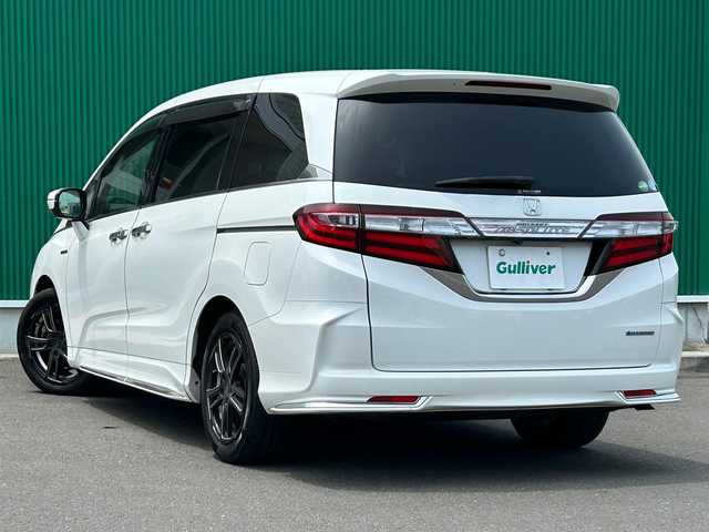 ホンダ オデッセイ ハイブリッド アブソルートセンシングEXパック 宮城県 2017(平29)年 11.7万km ホワイトオーキッドパール ホンダセンシング/・CMBS(衝突被害軽減ブレーキ)/・誤発進抑制機能/・歩行者事故低減ステアリング/・路外逸脱抑制機能/・LKAS（車線維持支援システム）/・先行車発進お知らせ機能/・標識認識機能/・アダプティブクルーズコントロール/純正ナ8インチナビ/フルセグTV/Bluetooth/CD/DVD/SD/MSV/フリップダウンモニター/バックカメラ/ビルトインETC/両側パワースライドドア/本革巻きステアリング/ステアリングスイッチ/LEDヘッドランプ/フォグランプ/オートライト/純正フロアマット/サイドバイザー/プッシュエンジンスタート/スマートキー/電動格納ドアミラー