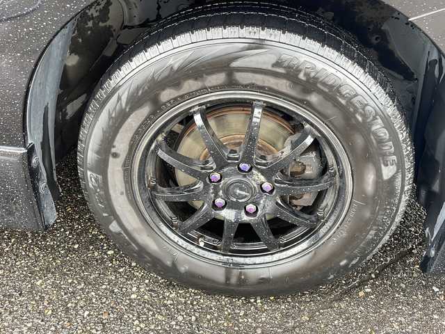 日産 エルグランド ライダー ブラックライン 新潟県 2012(平24)年 12.8万km ファントムブラック ４WD/メーカーオプションナビゲーション/アラウンドビューモニター/黒レザーシート/両側パワースライドドア/後席モニター/パワーバックドア/社外16インチarumiho/革巻きステアリング/ステアリングリモコン/オットマン/前席パワーシート/前席シートヒーター/横滑り防止装置/社外デジタルインナーミラー