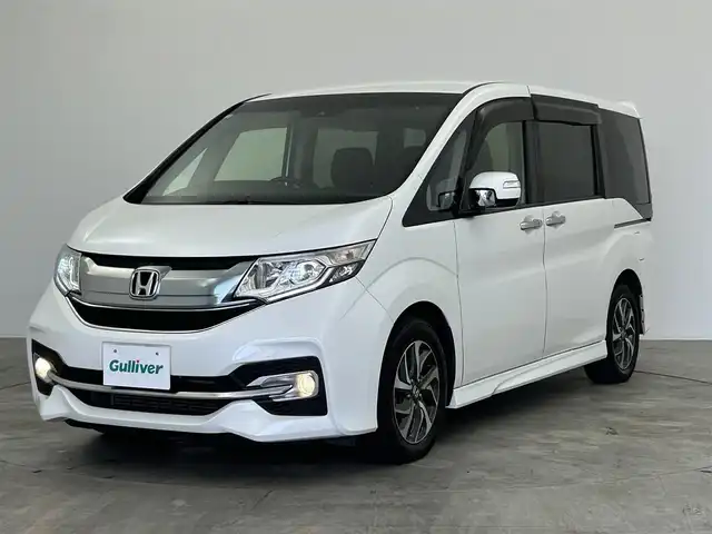 ホンダ ステップワゴン スパーダ ホンダセンシング 群馬県 2017(平29)年 6.2万km ホワイトオーキッドパール フリップダウンモニター　ターボ　純正９インチナビ　バックカメラ　両側パワースライドドア　ＬＥＤライト　純正１６インチＡＷ　ステアリングリモコン　パドルシフト　ビルトインＥＴＣ　プッシュスタート　禁煙車