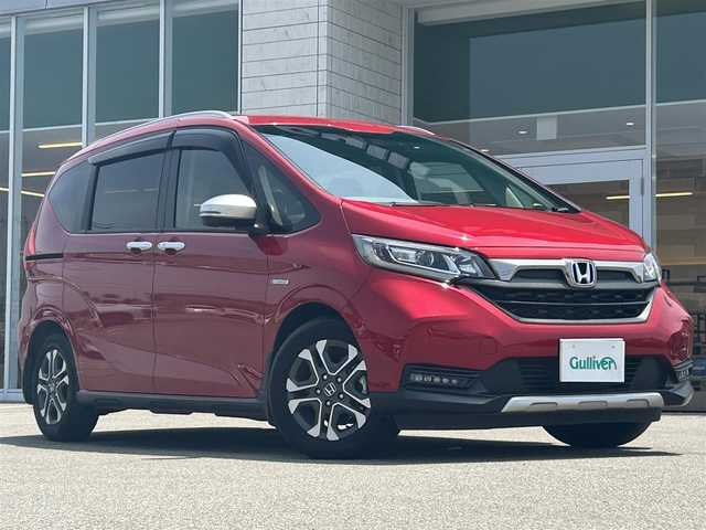 ホンダ フリード＋ ハイブリット クロスター ホンダセンシング 兵庫県 2022(令4)年 2万km プレミアムクリスタルレッドM 純正SDナビ/フルセグTV/BTオーディオ/バックカメラ/ビルトインETC/前後ドライブレコーダー/両側パワースライドドア/前席シートヒーター/LEDオートライト/ホンダセンシング/クルーズコントロール（追従走行アリ）