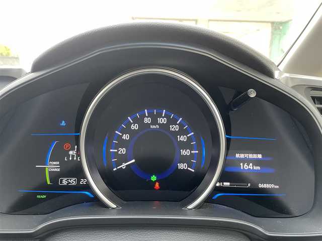 ホンダ フィット ハイブリット Lパッケージ 埼玉県 2014(平26)年 6.9万km ライトベージュM 16号上尾南店代車落札予定になります落札不可になります/ワンオーナー/純正ナビ/（フルセグTV/FM/AM/CD/USB/IPOD/BT/HDMI)/クルーズコントロール/バックカメラ/ETC/ステアリングリモコン/純正15インチAW/スマートスペアキー×1/プッシュスタート/純正ドアバイザー/純正フロアマット/ドアミラーウィンカー/パワーウィンドウ/集中ドアロック/車両/ナビ取扱説明書