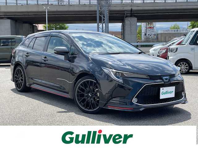 トヨタ カローラツーリング ハイブリッド ダブルバイビー 石川県 2020(令2)年 1万km ブラックマイカ ワンオーナー/純正ディスプレイオーディオ/ナビ/フルセグTV/バックカメラ/LEDヘッドライト/ビルトインETC/TRDエアロ/TRDアルミホイール/トヨタセーフティセンス/レーダークルーズ/ハーフレザーシート/シートヒーター/スマートキー/プッシュスタート/ドライブレコーダー/保証書