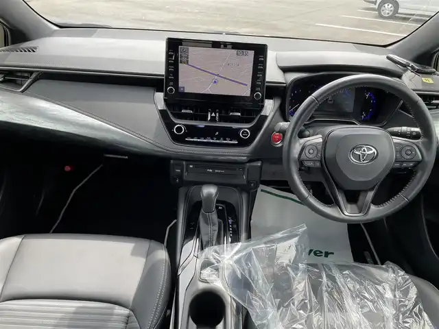 トヨタ カローラツーリング ハイブリッド ダブルバイビー 石川県 2020(令2)年 1万km ブラックマイカ ワンオーナー/純正ディスプレイオーディオ/ナビ/フルセグTV/バックカメラ/LEDヘッドライト/ビルトインETC/TRDエアロ/TRDアルミホイール/トヨタセーフティセンス/レーダークルーズ/ハーフレザーシート/シートヒーター/スマートキー/プッシュスタート/ドライブレコーダー/保証書