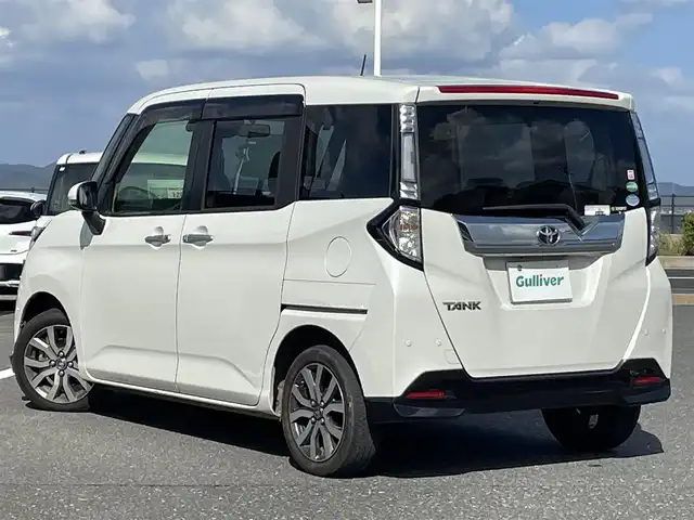 トヨタ タンク カスタムG－T 島根県 2019(令1)年 10.4万km パールホワイトⅢ 登録時走行距離　103975km/ワンオーナ/取扱説明書/保証書/純正ナビ（NSZT-W68T）/（Bluetooth/CD/DVD/AM/FM)/フルセグテレビ/全周囲カメラ/クルーズコントロール/シートヒーター（DN席）/両側パワースライドドア/横滑り防止装置/衝突軽減ブレーキ/オートマチックハイビーム/コーナーセンサー/ビルドインETC/純正アルミ１５インチ