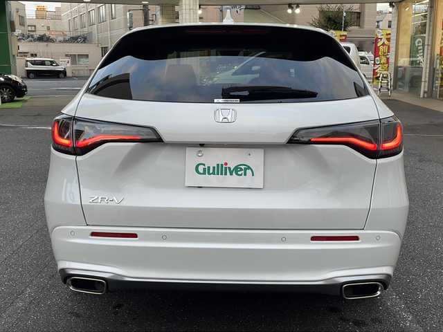 ホンダ ＺＲ－Ｖ Z 埼玉県 2023(令5)年 0.7万km プラチナホワイトパール ワンオーナー/登録時6312ｋｍ/純正ナビ（BT・フルセグTV）/BOSEスピーカー/アランドビューモニター/黒レザーシート(合皮）/前席パワーシート/前席シートヒーター/パワーバックドア/衝突軽減ブレーキ/レーンキープアシスト/アクティブクルーズコントロール/パドルシフト/純正１８インチAW/LEDヘッドライト/プッシュスタート/スマートキー×２/置くだけ充電/ビルトインETC2.0/横滑り防止/革巻きステアリング/ステアリングヒーター/リアスポイラー/ウィンカーミラー/純正フロアマット/純正ドアバイザー/保証書/取扱説明書/ナビ取扱説明書