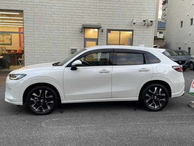 ホンダ ＺＲ－Ｖ Z 埼玉県 2023(令5)年 0.7万km プラチナホワイトパール ワンオーナー/登録時6312ｋｍ/純正ナビ（BT・フルセグTV）/BOSEスピーカー/アランドビューモニター/黒レザーシート(合皮）/前席パワーシート/前席シートヒーター/パワーバックドア/衝突軽減ブレーキ/レーンキープアシスト/アクティブクルーズコントロール/パドルシフト/純正１８インチAW/LEDヘッドライト/プッシュスタート/スマートキー×２/置くだけ充電/ビルトインETC2.0/横滑り防止/革巻きステアリング/ステアリングヒーター/リアスポイラー/ウィンカーミラー/純正フロアマット/純正ドアバイザー/保証書/取扱説明書/ナビ取扱説明書