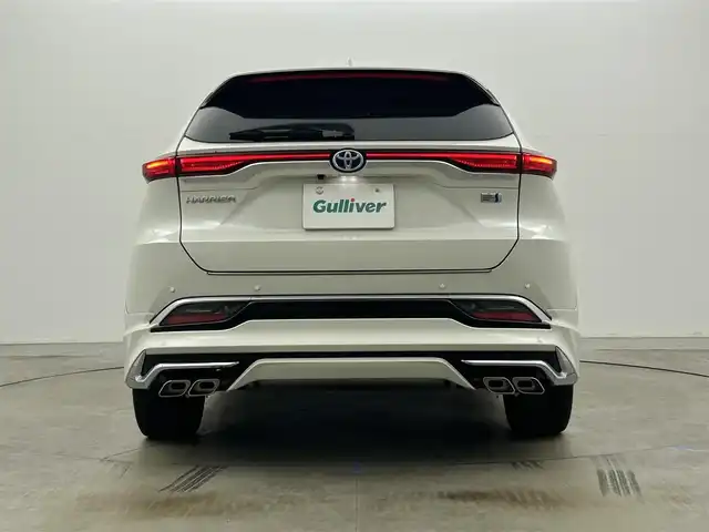 トヨタ ハリアー ハイブリッド Z 岡山県 2021(令3)年 3.4万km ホワイトパールクリスタルシャイン モデリスタエアロ/ＪＢＬサウンド/純正１２．３インチナビ/【Bluetooth/フルセグTV/Carplay】/デジタルインナーミラー/レーダークルーズコントロール/衝突軽減ブレーキシステム/運転席パワーシート/ハーフレザーシート　/ブラインドスポットモニター/ヘッドアップディスプレイ/ビルトインETC2.0/LEDヘッドライト/純正フロアマット/ドアバイザー/新車保証書/取扱説明書/スペアキー×１