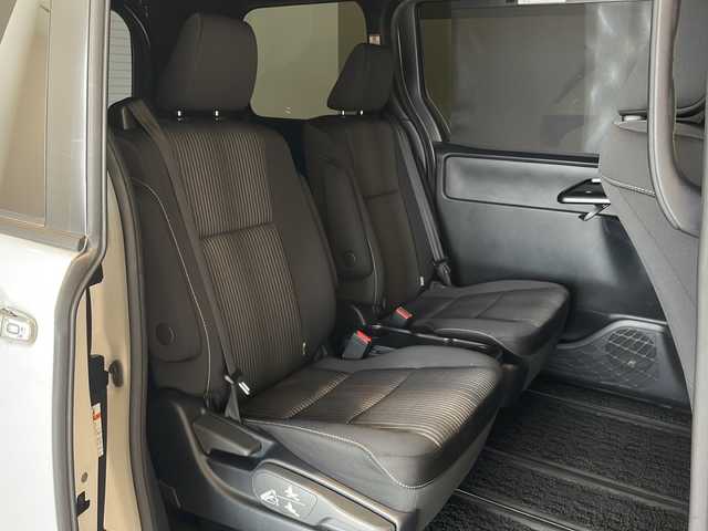 トヨタ ヴォクシー ZS 煌Ⅱ 福井県 2020(令2)年 5万km ホワイトパールクリスタルシャイン 純正9インチSDナビ/フルセグTV/バックカメラ/フリップダウンモニター/純正サイドスポイラー/ビルトインETC/両側パワースライドドア/クルーズコントロール/レーンキープアシスト/コーナーセンサー/MTモード付AT/純正１６インチアルミホイール/LEDヘッドライト/フォグランプ/オートライト/オートハイビーム/衝突被害軽減ブレーキ/純正フロアマット/リアロールサンシェード/プッシュスタート/スマートキー