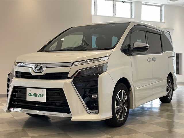 トヨタ ヴォクシー ZS 煌Ⅱ 福井県 2020(令2)年 5万km ホワイトパールクリスタルシャイン 純正9インチSDナビ/フルセグTV/バックカメラ/フリップダウンモニター/純正サイドスポイラー/ビルトインETC/両側パワースライドドア/クルーズコントロール/レーンキープアシスト/コーナーセンサー/MTモード付AT/純正１６インチアルミホイール/LEDヘッドライト/フォグランプ/オートライト/オートハイビーム/衝突被害軽減ブレーキ/純正フロアマット/リアロールサンシェード/プッシュスタート/スマートキー