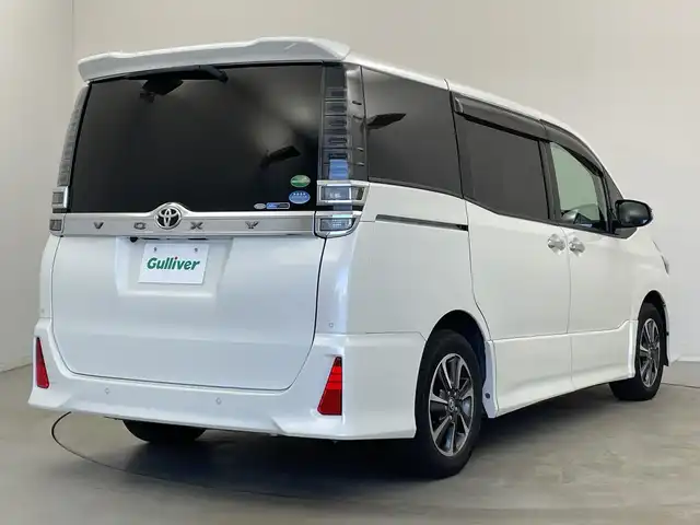 トヨタ ヴォクシー ZS 煌Ⅱ 新潟県 2020(令2)年 5万km ホワイトパールクリスタルシャイン 純正9インチSDナビ/フルセグTV/バックカメラ/フリップダウンモニター/純正サイドスポイラー/ビルトインETC/両側パワースライドドア/クルーズコントロール/レーンキープアシスト/コーナーセンサー/MTモード付AT/純正１６インチアルミホイール/LEDヘッドライト/フォグランプ/オートライト/オートハイビーム/衝突被害軽減ブレーキ/純正フロアマット/リアロールサンシェード/プッシュスタート/スマートキー