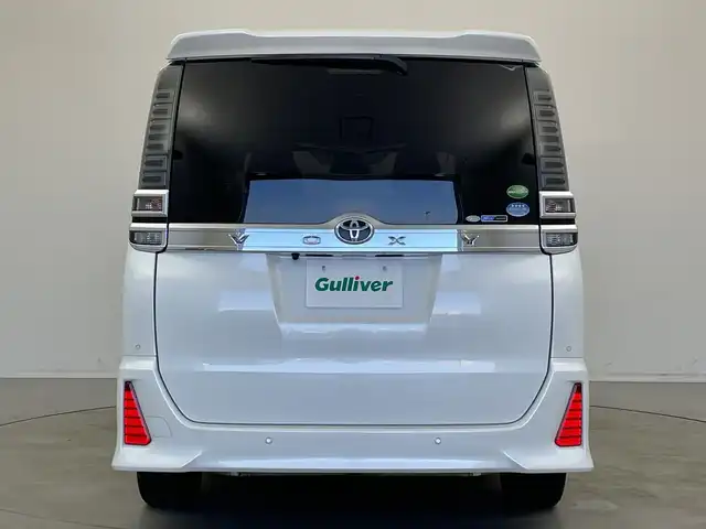 トヨタ ヴォクシー ZS 煌Ⅱ 新潟県 2020(令2)年 5万km ホワイトパールクリスタルシャイン 純正9インチSDナビ/フルセグTV/バックカメラ/フリップダウンモニター/純正サイドスポイラー/ビルトインETC/両側パワースライドドア/クルーズコントロール/レーンキープアシスト/コーナーセンサー/MTモード付AT/純正１６インチアルミホイール/LEDヘッドライト/フォグランプ/オートライト/オートハイビーム/衝突被害軽減ブレーキ/純正フロアマット/リアロールサンシェード/プッシュスタート/スマートキー