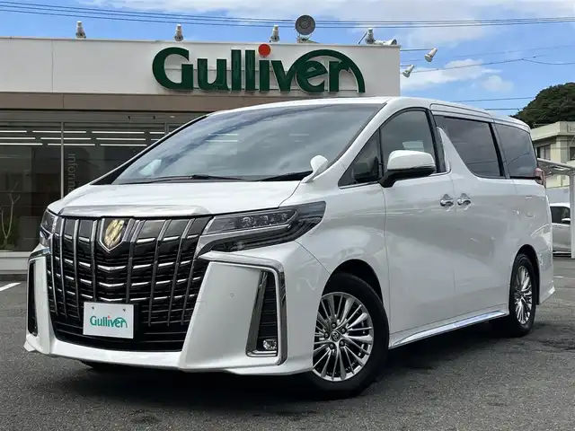 トヨタ アルファード S タイプゴールド 三重県 2020(令2)年 7.7万km ホワイトパールクリスタルシャイン ワンオーナー/ムーンルーフ/パワーバックドア /純正フリップダウンモニター/Toyota Safety Sense/ ・PCS(プリクラッシュセーフティ)/ ・LTA(レーントレーシングアシスト)/ ・AHB(オートマチックハイビーム)/ ・RSA(ロードサインアシスト)/ ・レーダークルーズコントロール/ ・先行車発進告知機能/♪ブラインドスポットモニター/♪リヤクロストラフィックアラート/♪パーキングサポートブレーキ/♪クリアランスソナー/♪純正ディスプレイオーディオ/・フルセグ・CD/DVD再生・USB/・Apple Car Play・Mira Cast/・Android Auto・BTオーディオ/♪バックガイドカメラ/♪デジタルインナーミラー/♪両側ワンタッチパワースライドドア/♪オートブレーキホールド/♪スマートキーx2/♪プッシュスタート/♪ハーフレザーシート/♪オットマン/♪三眼LEDヘッドライト/♪LEDフォグライト /♪オートライト/♪オートリトラクタブルミラー/♪ウィンカーミラー/♪純正17インチAW/♪ドライブレコーダー前後/♪ウッドコンビステアリング/♪ステアリングスイッチ/♪フロアマット/♪ビルトインETC/♪横滑り防止装置/♪サイド/カーテン/ニーエアバック