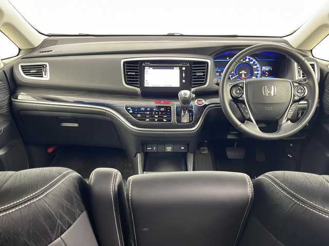 ホンダ オデッセイ ハイブリッド アブソルート ホンダセンシング 埼玉県 2016(平28)年 6.6万km プレミアムヴィーナスブラックP 両側パワースライドドア/純正ナビ/（TV/AM/FM/BT/CD/DVD）/全方位カメラ/２列目オットマン/ビルトインETC/ドライブレコーダー/ブラインドスポットモニター/レーダークルーズコントロール/D席パワーシート/ステアリングリモコン/両側パワースライドドア/後部コーナーセンサー/LEDオートライト/フォグランプ/純正17インチアルミホイール/HDMI/スマートキー×２