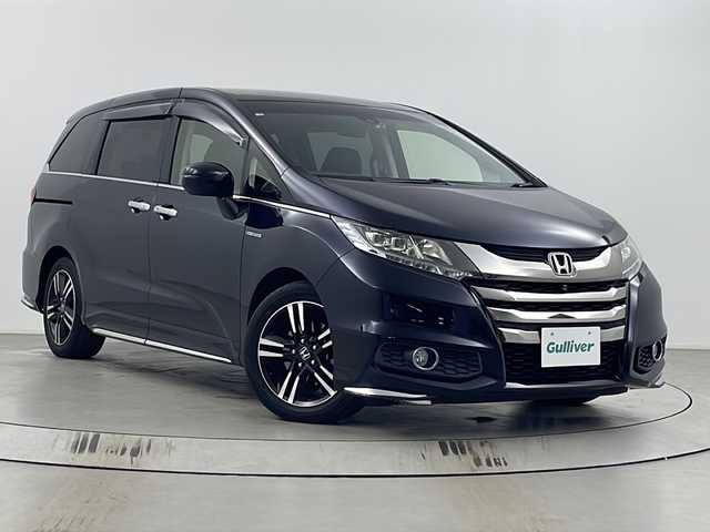 ホンダ オデッセイ ハイブリッド アブソルート ホンダセンシング 埼玉県 2016(平28)年 6.6万km プレミアムヴィーナスブラックP 両側パワースライドドア/純正ナビ/（TV/AM/FM/BT/CD/DVD）/全方位カメラ/２列目オットマン/ビルトインETC/ドライブレコーダー/ブラインドスポットモニター/レーダークルーズコントロール/D席パワーシート/ステアリングリモコン/両側パワースライドドア/後部コーナーセンサー/LEDオートライト/フォグランプ/純正17インチアルミホイール/HDMI/スマートキー×２
