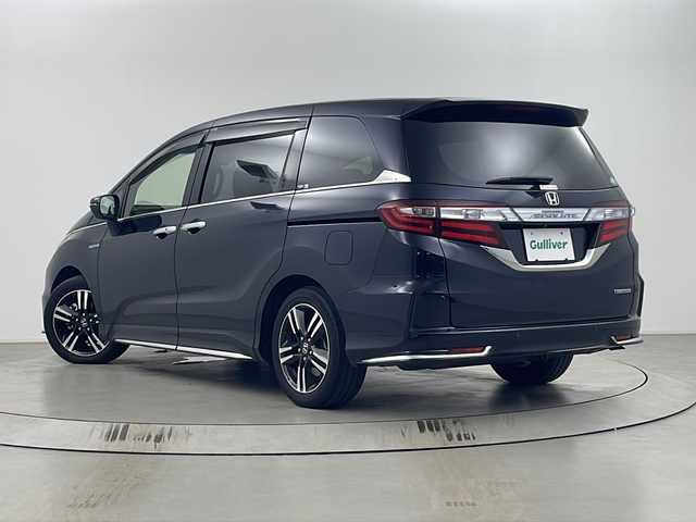 ホンダ オデッセイ ハイブリッド アブソルート ホンダセンシング 埼玉県 2016(平28)年 6.6万km プレミアムヴィーナスブラックP 両側パワースライドドア/純正ナビ/（TV/AM/FM/BT/CD/DVD）/全方位カメラ/２列目オットマン/ビルトインETC/ドライブレコーダー/ブラインドスポットモニター/レーダークルーズコントロール/D席パワーシート/ステアリングリモコン/両側パワースライドドア/後部コーナーセンサー/LEDオートライト/フォグランプ/純正17インチアルミホイール/HDMI/スマートキー×２