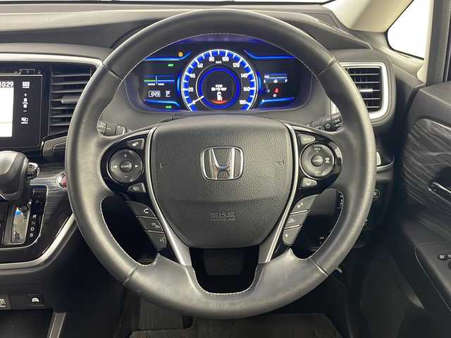 ホンダ オデッセイ ハイブリッド アブソルート ホンダセンシング 埼玉県 2016(平28)年 6.6万km プレミアムヴィーナスブラックP 両側パワースライドドア/純正ナビ/（TV/AM/FM/BT/CD/DVD）/全方位カメラ/２列目オットマン/ビルトインETC/ドライブレコーダー/ブラインドスポットモニター/レーダークルーズコントロール/D席パワーシート/ステアリングリモコン/両側パワースライドドア/後部コーナーセンサー/LEDオートライト/フォグランプ/純正17インチアルミホイール/HDMI/スマートキー×２