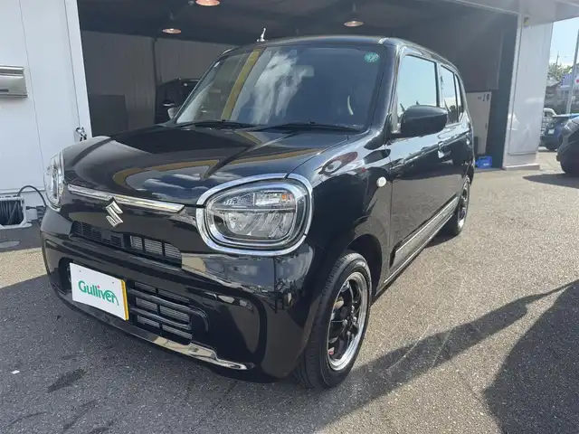 スズキ アルト L 愛知県 2024(令6)年 1.5万km ブルーイッシュブラックパール3 ワンオーナー車/ユーザー買取車/取説/手帳/保証書/スズキセーフティサポート/バックセンサー/両側シートヒーター/アイドリングストップ/レーン逸脱センサー/メッキパーツ/社外14インチアルミ/リモコンキー/純正オプションHID/アップグレードパッケージ