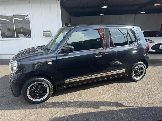 スズキ アルト L 愛知県 2024(令6)年 1.5万km ブルーイッシュブラックパール3 ワンオーナー車/ユーザー買取車/取説/手帳/保証書/スズキセーフティサポート/バックセンサー/両側シートヒーター/アイドリングストップ/レーン逸脱センサー/メッキパーツ/社外14インチアルミ/リモコンキー/純正オプションHID/アップグレードパッケージ