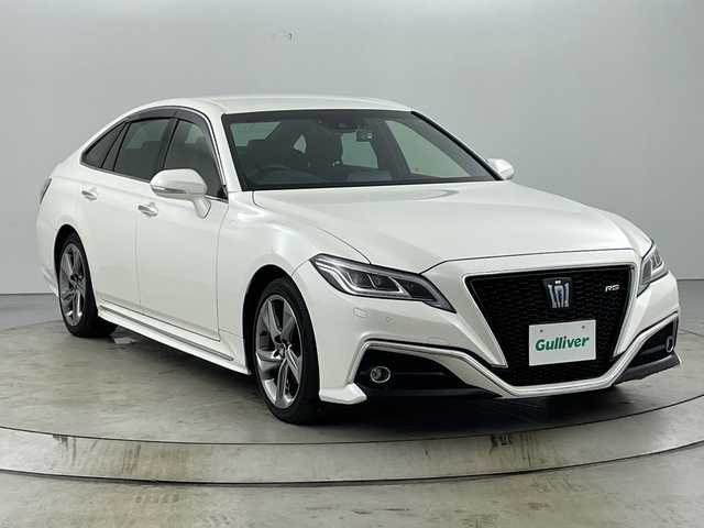 トヨタ クラウン ハイブリッド RS アドバンス 愛知県 2020(令2)年 7万km ホワイトパールクリスタルシャイン 禁煙車/純正8インチナビ/（AM/FM/Bluetooth/フルセグTV/USB)/バックカメラ/トヨタセーフティセンス/・プリクラッシュセーフティ/・レーダークルーズコントロール/・レーントレーシングアシスト/・オートマチックハイビーム/・クリアランスソナー/・ブラインドスポットモニター/ヘッドアップディスプレイ/ETC2.0/前後ドライブレコーダー/ハーフレザーシート/前席シートヒーター/ステアリングヒーター/パワーシート/パドルシフト/純正18インチアルミホイール/プッシュスタート/スマートキー/スペアキー1本/オートライト/LEDヘッドライト/フロントフォグランプ/純正フロアマット/ドアバイザー