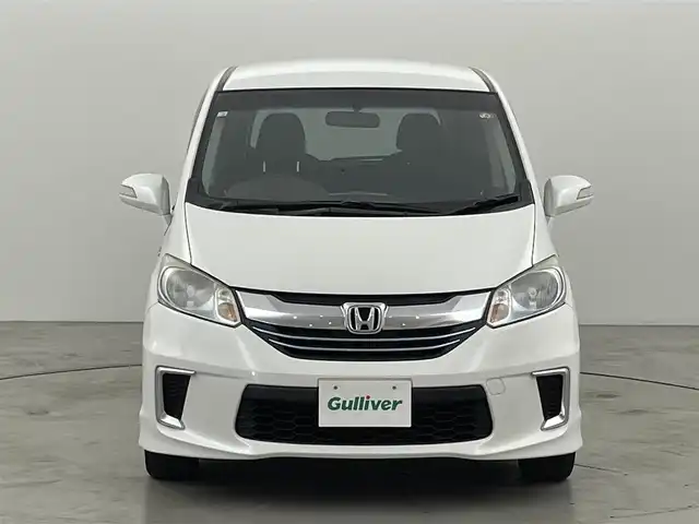 ホンダ フリード ハイブリット ジャストセレクション 福岡県 2014(平26)年 8.6万km ホワイトオーキッドパール 純正ナビ（ＢＴ，フルセグＴＶ）　/バックカメラ　/ビルトインＥＴＣ　/クルーズコントロール　/横滑り防止装置　/ＥＣＯＮ　/アイドリングストップ　/両側電動スライドドア　/電動格納式ドアミラー　/純正フロアマット