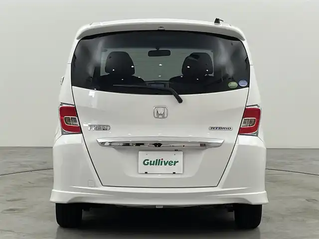 ホンダ フリード ハイブリット ジャストセレクション 福岡県 2014(平26)年 8.6万km ホワイトオーキッドパール 純正ナビ（ＢＴ，フルセグＴＶ）　/バックカメラ　/ビルトインＥＴＣ　/クルーズコントロール　/横滑り防止装置　/ＥＣＯＮ　/アイドリングストップ　/両側電動スライドドア　/電動格納式ドアミラー　/純正フロアマット