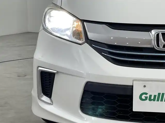ホンダ フリード ハイブリット ジャストセレクション 福岡県 2014(平26)年 8.6万km ホワイトオーキッドパール 純正ナビ（ＢＴ，フルセグＴＶ）　/バックカメラ　/ビルトインＥＴＣ　/クルーズコントロール　/横滑り防止装置　/ＥＣＯＮ　/アイドリングストップ　/両側電動スライドドア　/電動格納式ドアミラー　/純正フロアマット