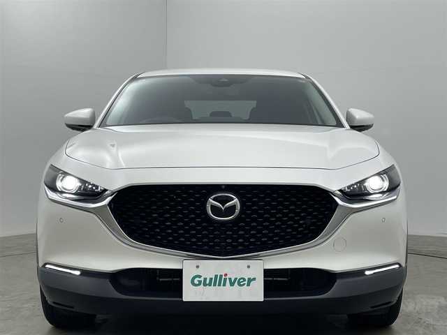 マツダ ＣＸ－３０ XD プロアクティブツーリングセレクション 岡山県 2020(令2)年 5.9万km スノーフレイクホワイトパールマイカ 純正8.8インチナビ	/【ナビ/フルセグ/Bluetooth/DVD/Carplay/HDMI】	/３６０°カメラ/追従型クルーズコントロール	/オートハイビーム	/LEDヘッドライト（AUTO機能付き）	/ビルトインETC	/前席シートヒーター	/ステアリングヒーター/運転席パワーシート	/衝突軽減ブレーキシステム	/車線逸脱防止システム	/横滑り防止装置	/踏み間違い防止/オートブレーキホールド/ブラインドスポットモニター/純正18インチアルミ	/コーナーセンサー（前後）	/社外フロアマット	/ステアリングスイッチ	/ヘッドアップディスプレイ/シートリフター/ウィンカーミラー/パドルシフト/プッシュスタート	/スマートキー×2		/ナビ取扱説明書