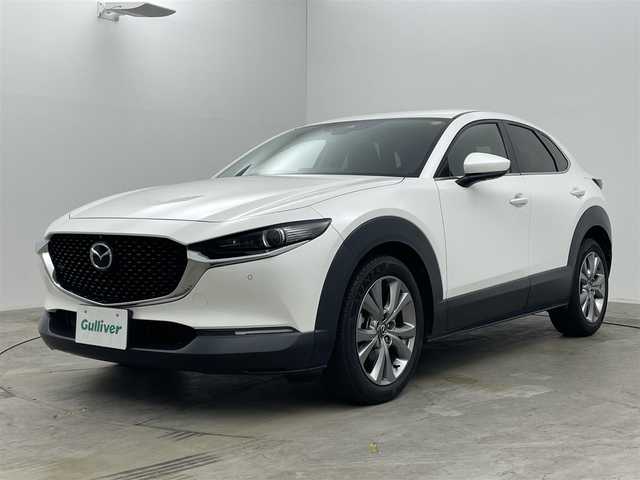 マツダ ＣＸ－３０ XD プロアクティブツーリングセレクション 岡山県 2020(令2)年 5.9万km スノーフレイクホワイトパールマイカ 純正8.8インチナビ	/【ナビ/フルセグ/Bluetooth/DVD/Carplay/HDMI】	/３６０°カメラ/追従型クルーズコントロール	/オートハイビーム	/LEDヘッドライト（AUTO機能付き）	/ビルトインETC	/前席シートヒーター	/ステアリングヒーター/運転席パワーシート	/衝突軽減ブレーキシステム	/車線逸脱防止システム	/横滑り防止装置	/踏み間違い防止/オートブレーキホールド/ブラインドスポットモニター/純正18インチアルミ	/コーナーセンサー（前後）	/社外フロアマット	/ステアリングスイッチ	/ヘッドアップディスプレイ/シートリフター/ウィンカーミラー/パドルシフト/プッシュスタート	/スマートキー×2		/ナビ取扱説明書