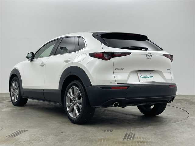 マツダ ＣＸ－３０ XD プロアクティブツーリングセレクション 岡山県 2020(令2)年 5.9万km スノーフレイクホワイトパールマイカ 純正8.8インチナビ	/【ナビ/フルセグ/Bluetooth/DVD/Carplay/HDMI】	/３６０°カメラ/追従型クルーズコントロール	/オートハイビーム	/LEDヘッドライト（AUTO機能付き）	/ビルトインETC	/前席シートヒーター	/ステアリングヒーター/運転席パワーシート	/衝突軽減ブレーキシステム	/車線逸脱防止システム	/横滑り防止装置	/踏み間違い防止/オートブレーキホールド/ブラインドスポットモニター/純正18インチアルミ	/コーナーセンサー（前後）	/社外フロアマット	/ステアリングスイッチ	/ヘッドアップディスプレイ/シートリフター/ウィンカーミラー/パドルシフト/プッシュスタート	/スマートキー×2		/ナビ取扱説明書