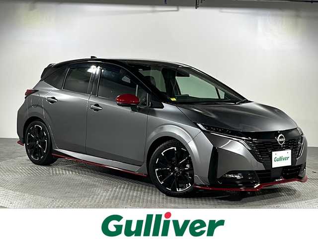 日産 オーラ ニスモ 沖縄県 2023(令5)年 1.2万km ダークメタルグレー/スーパーブラック2トーン 禁煙車　/県外仕入れ　/９インチ純正ナビ/【ＣＤ／フルセグＴＶ／ＢＴ】　/ビルトインETC/アラウンドビューモニター　/エマージェンシーブレーキ　/ブラインドスポットモニター　/車線逸脱防止支援　/インテリジェントルームミラー　/ＬＥＤヘッドライト/スマートキー