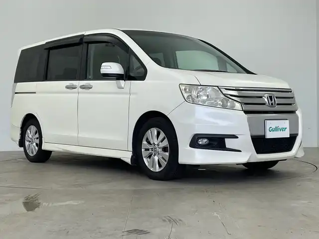ホンダ ステップワゴン スパーダ Z HDDナビED 鹿児島県 2011(平23)年 14.7万km プレミアムホワイトパール ワンオーナー　/純正ナビ　/（フルセグ/Ｂｌｕｅｔｏｏｔｈ/CD/DVD)　/バックカメラ　/両側パワースライドドア　/ドアバイザー　/パドルシフト　/純正フロアマット　/ＥＴＣ　/純正１６インチアルミホイール　/スマートキー/スペアキー1本/保証書　/取扱説明書