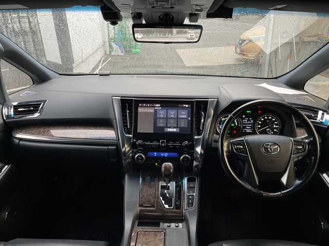 トヨタ アルファードハイブリット エグゼクティブ ラウンジ S 福岡県 2020(令2)年 5.8万km ブラック 純正10インチナビ/【CD.DVD.Bluetooth.フルセグTV】/パノラミックビューモニター/サンルーフ/モデリスタエアロ/JBLプレミアムサウンド/純正フリップダウンモニター/デジタルインナーミラー/追従クルーズコントロール/レーンキープアシスト/パワーバックドア/両側電動スライドドア/ビルトインETC2.0/全周囲ドライブレコーダー/レザーシート/シートヒーター/ベンチレーション/パワーシート/3眼LEDヘッドライト/オートライト/オートハイビーム/パーキングアシスト/クリアランスソナー