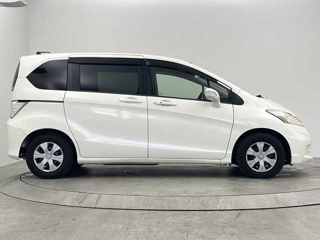 ホンダ フリード G ジャストセレクション 大阪府 2011(平23)年 13万km プレミアムホワイトパール 社外HDDナビ/【フルセグTV/CD/FM/AM/USB】/片側パワースライドドア/片側スライドドア/クルーズコントロール/バックカメラ/ハロゲンヘッドライト/スマートキー