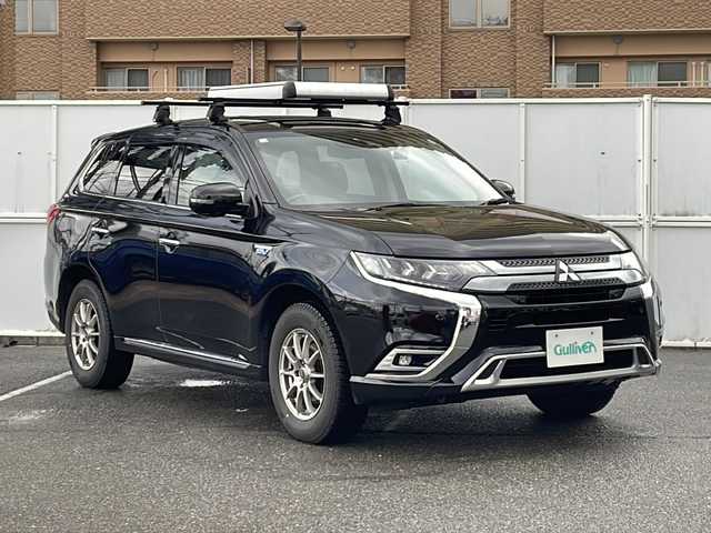 三菱 アウトランダー ＰＨＥＶ G 秋田県 2020(令2)年 9.4万km アメジストブラック SDナビ　GCX７７９W/CD　DVD　Bluetooth　DTV　SD　ラジオ/全周囲カメラ/ETC/LDW（車線逸脱警報）/アダプティブ・クルーズ・コントロール/衝突軽減ブレーキサポート/パワーバックドア/前席パワーシート/前席シートヒーター/ハーフレザーシート/ハイビームアシスト/オートライト/フォグランプ/ハンドルヒーター/BSM（ブラインドスポットモニター）/純正AWサマータイヤ積み込み