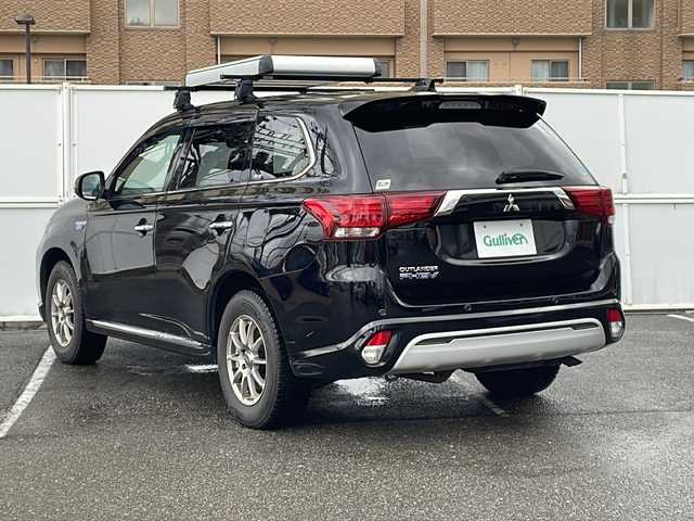 三菱 アウトランダー ＰＨＥＶ G 秋田県 2020(令2)年 9.4万km アメジストブラック SDナビ　GCX７７９W/CD　DVD　Bluetooth　DTV　SD　ラジオ/全周囲カメラ/ETC/LDW（車線逸脱警報）/アダプティブ・クルーズ・コントロール/衝突軽減ブレーキサポート/パワーバックドア/前席パワーシート/前席シートヒーター/ハーフレザーシート/ハイビームアシスト/オートライト/フォグランプ/ハンドルヒーター/BSM（ブラインドスポットモニター）/純正AWサマータイヤ積み込み