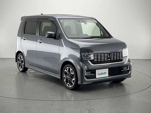 ホンダ Ｎ ＷＧＮ カスタム Lターボ ホンダS 長野県 2020(令2)年 4.9万km シャイニンググレーM ワンオーナー/純正SDナビ&フルセグTV&CD&DVD&USB&BT/ホンダセンシング/・アダプティブクルーズコントロール/・レーンキープアシスト/・衝突軽減ブレーキ/・路外逸脱警報/・歩行者事故低減ステアリング/・先行車発進告知/・標識認識機能/・誤発進抑制機能/・後方誤発進抑制機能/・オートマチックハイビーム/アイドリングストップ/ハーフレザーシート/D席シートヒーター/ステアリングスイッチ/パドルシフト/バックカメラ/ビルトインETC/LEDヘッドライト/オートライト/フロントフォグランプ/電動格納ミラー/ウィンカーミラー/電動ホールド/ブレーキホールド/純正15インチAW付サマータイヤ装着/社外14インチAW付スタッドレスタイヤ積込/純正フロアマット/ドアバイザー/プッシュスタート/スマートキー/スペアキー1本/取扱説明書/保証書