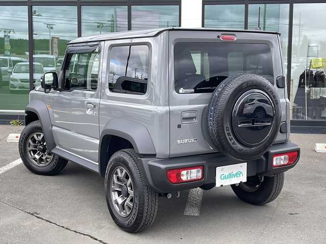 スズキ ジムニー シエラ JC 道東・釧路十勝 2022(令4)年 0.8万km ミディアムグレー ・ワンオーナー/・４WD/・社外SDメモリナビ/（CD・DVD・AM・FM・BT・SD・フルセグ）/・デュアルセンサーブレーキサポート/・スマートキー/・プッシュスタート/・オートライト/・クルーズコントロール/・ヒルスタートアシスト/・横滑り防止装置/・電動格納ミラー/・背面タイヤ/・純正アルミホイール/・デフロック/・ETC/・保証書/・取説書
