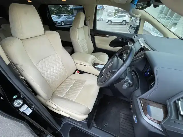 トヨタ ヴェルファイア ハイブリット X 道央・札幌 2018(平30)年 6.6万km ブラック ・４WD/・衝突軽減ブレーキ/・寒冷地仕様/・両側パワースライドドア/・サンルーフ/・純正ナビ/　CD＆DVD＆BT＆TV/・バックカメラ/・フリップダウンモニター/・コーナーセンサー/・レーンキープアシスト/・レーダークルーズコントロール/・AC１００V /・ワイパー熱線/・オートエアコン/・オートライト/・オートリトラミラー/・ステアリングスイッチ/・ハンズフリー/・プッシュスタート/・スマートキー/・リアヒッチメンバー/・ビルトインETC/・LEDヘッドライト/・MT付きAT/・純正フロアマット/・ドアバイザー/・ウィンカーミラー/・フォグライト/・スペアキー